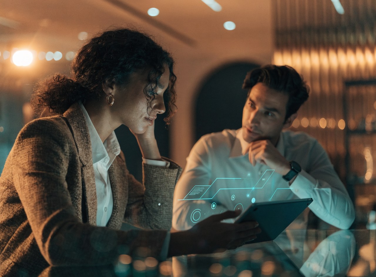 Clients reviewing a branded portal dashboard together